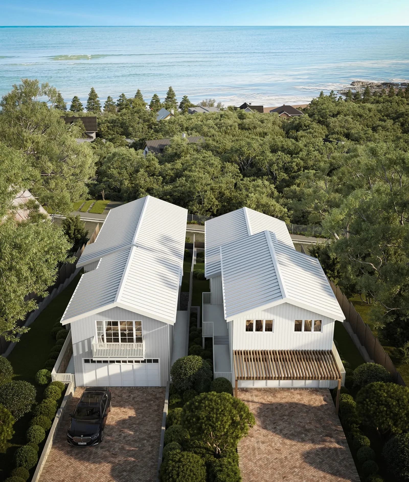 Aerial render of Dalys Cour Duplex's white standing-seam gable roofs set among coastal bushland, Coledale NSW — by N2Q Studio